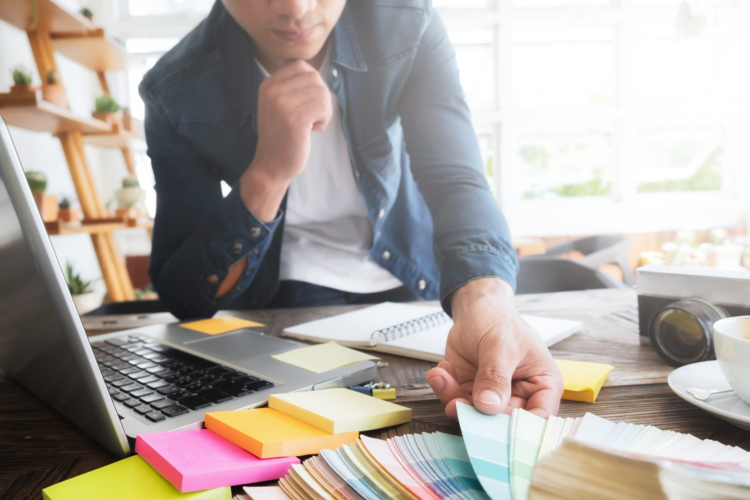 Man working with color samples for selection